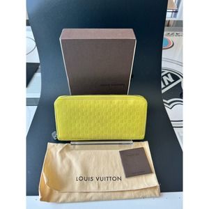 LOUIS VUITTON NEON DAMIER INFINI VERTICAL ZIPPY WALLET